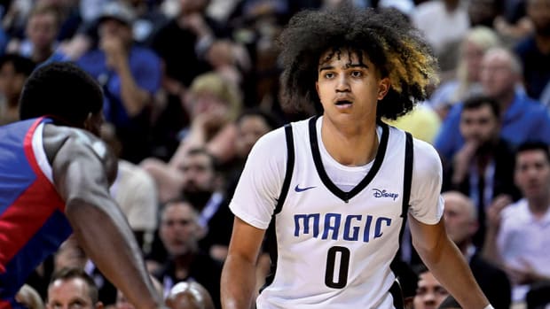 Former Arkansas guard Anthony Black brings the ball up the floor for the Orlando Magic during the NBA Summer League.